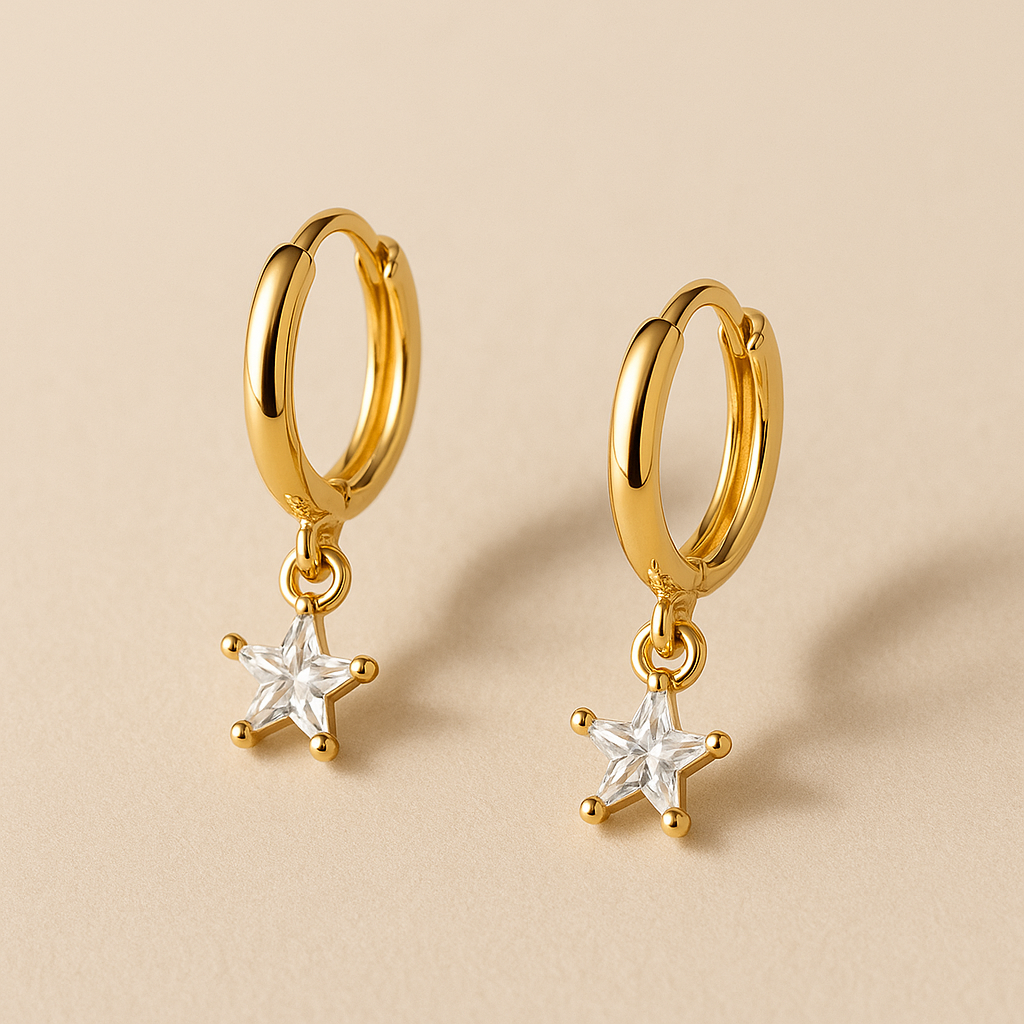 Brinco Stella Argolinha Dourada com Zircônia em Formato de Estrela